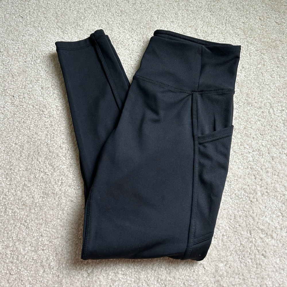 Danskin black athletic leggings with pockets. Size medium